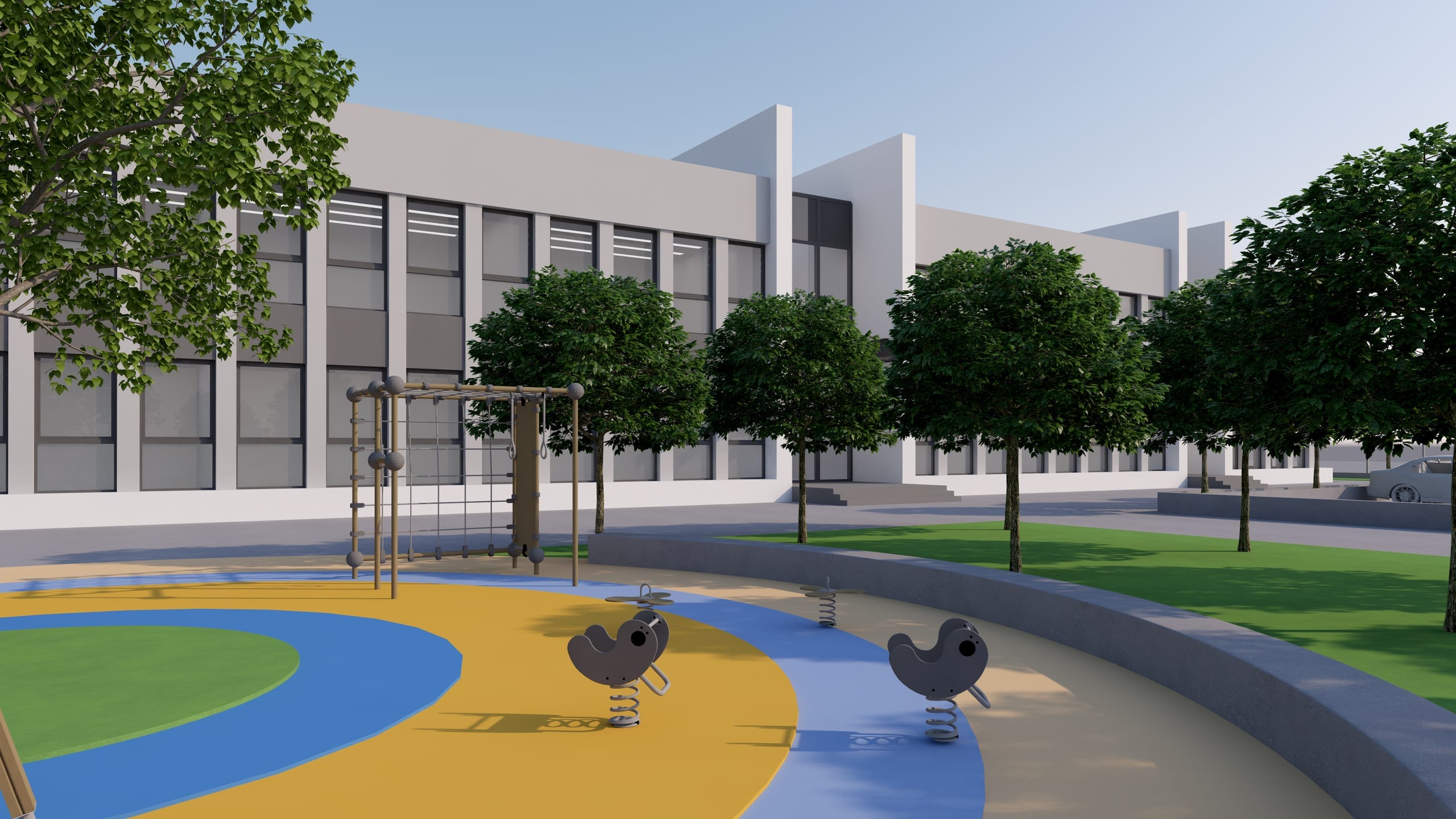 Școala Ocolna — locul de joacă și fațada principală